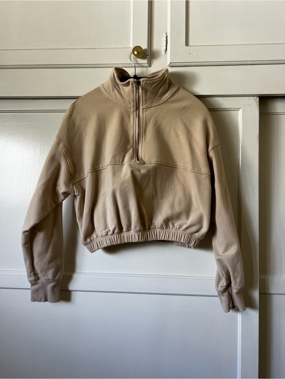 NIA Cropped Half-Zip Pullover Cropped Sweatshirt in Beige